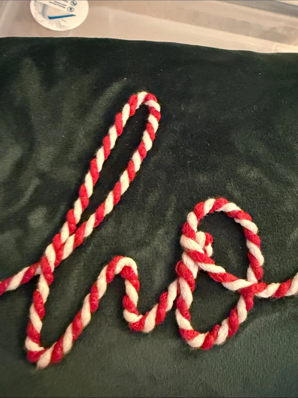 Source Unknown Dark Green Holiday Pillow with Red and White Rope 'hohoho'
